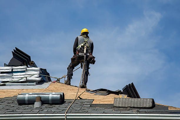 Professional Roofing technician working in Huntland, TN
